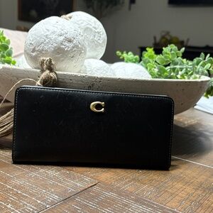 Coach Black Leather Continental Wallet with Gold 'C' Accent